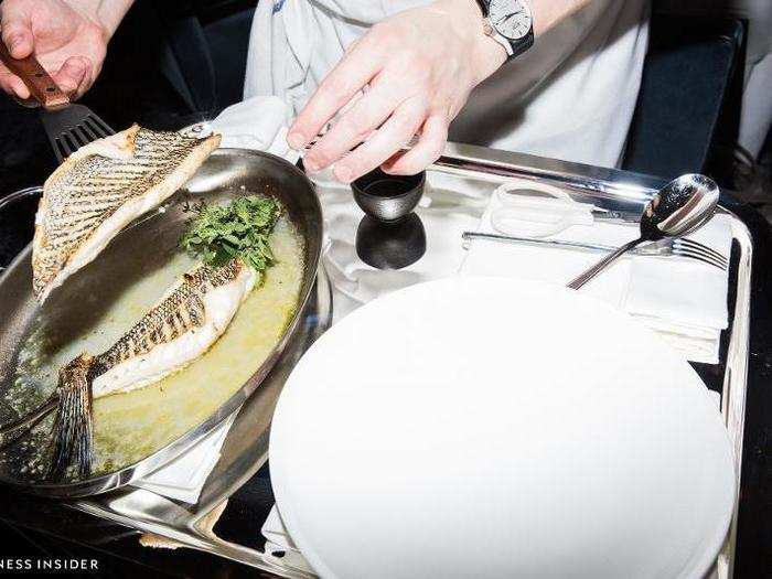 Whole fish can come broiled or slow-baked — here, the black bass.