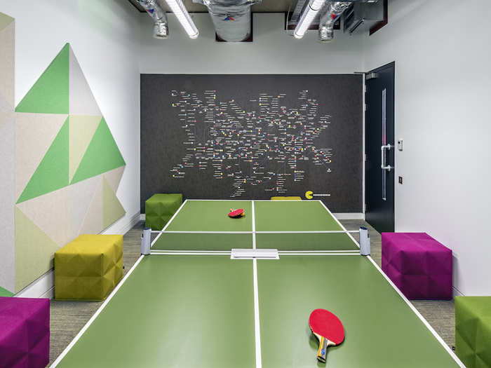 Inside, the office has a meeting room with a table tennis table.