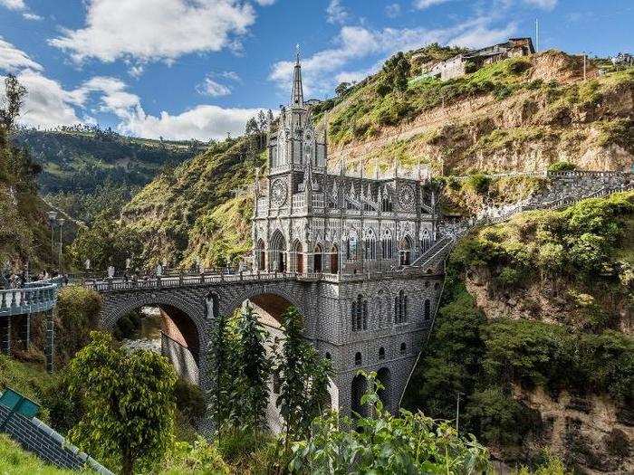 The Las Lajas Sanctuary in Narino, Colombia also looks like it defies gravity.