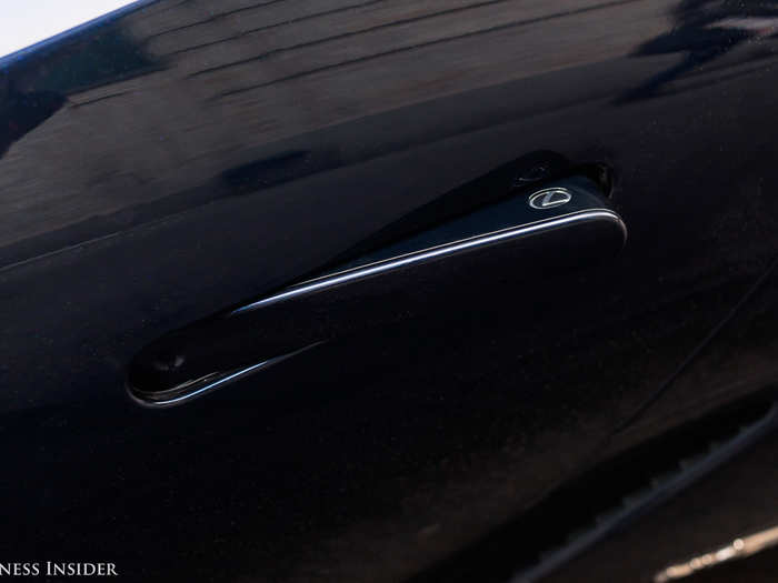 The door handles present themselves in response to the key fob — check out the tiny Lexus logo.