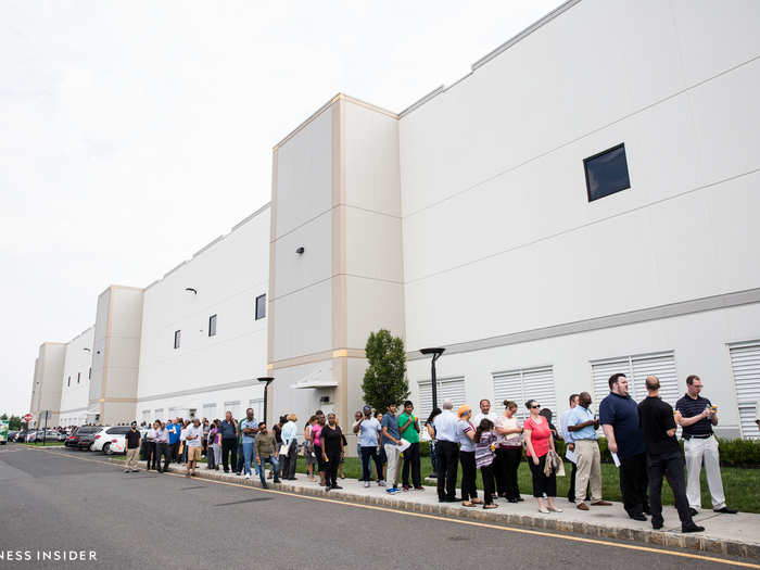 By the time we got outside, the line had already stretched out of sight. We walked down the line and found that it almost reached the end of the 1.2-million-square-foot warehouse.