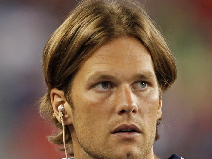 2011 Football Tom Brady liked to part his hair down the middle.