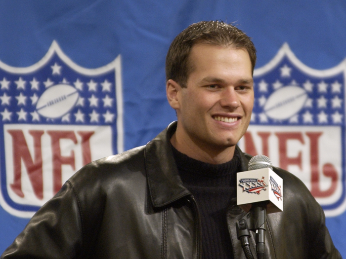 In 2002, Brady still had the standard college haircut and you can tell he wasn
