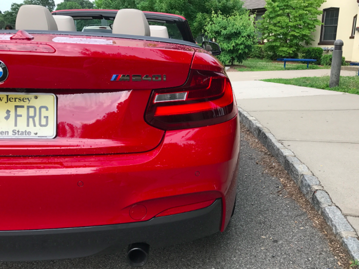 The distinctive M240i badging.