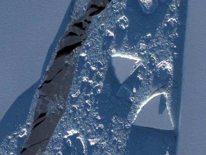 Zooming in on some of the details from Deimos-2 is revealing. This image shows mini-icebergs in a slush of ice between A-68 and the main Larsen C ice shelf.