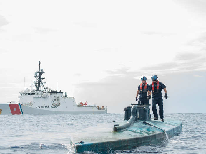 A Coast Guard Cutter Stratton boarding team investigates a self-propelled semisubmersible interdicted in international waters off the coast of Central America on July 19, 2015.