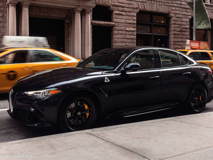 The Giulia is far more low-key — a dignified four-door, oozing luxury.