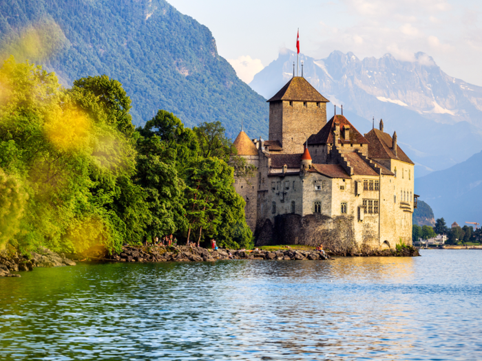 Chillon Castle is located on Lake Geneva, in Switzerland. It functioned as a prison during the Wars of Religion in the 16th century and later was turned into a weapons depot and outpost.