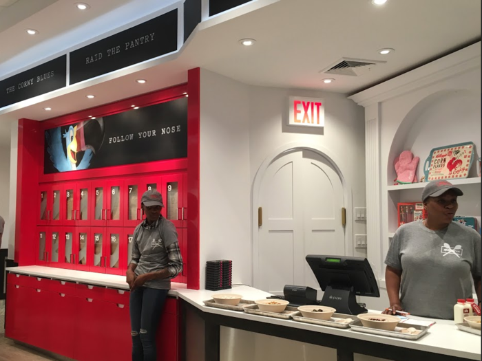 Customers pick up their order in a frosted cabinet.