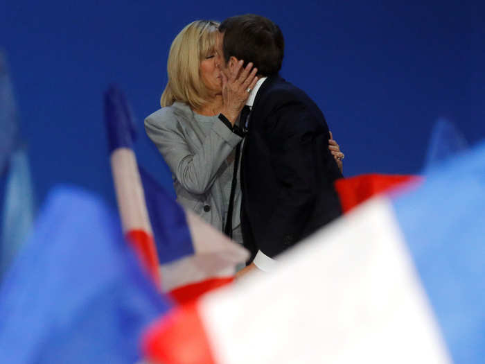 And she celebrated with Macron after early results in the first round of the 2017 French presidential election at the Parc des Expositions hall in Paris.