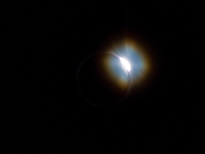 Totality ended after three minutes with the appearance of a second "diamond ring" on the opposite side of the moon. The eclipse phases then moved in reverse as the umbra sped eastward ahead of our jet.