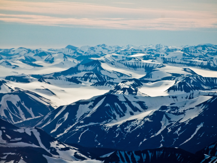 The plane also flew over the rugged terrain of Svalbard, a mountainous archipelago, and its glaciers.