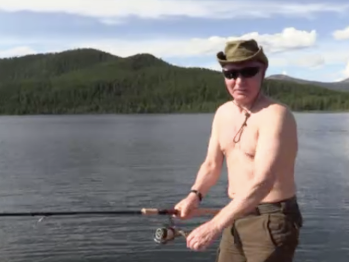 The video eventually cuts to a shirtless Putin casting a reel from the boat. For about 5 minutes, the camera watches him reel his line as his pectoral muscles bounce back and forth with each rotation. "Here, fishy, fishy!" he says at one point.