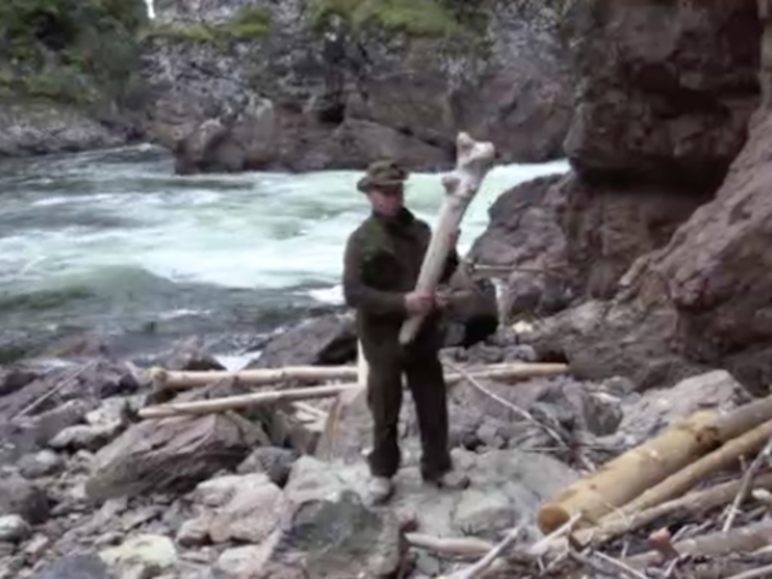 At one point, he picks up a giant log for no apparent reason and poses with it as if he were Bamm-Bamm Rubble from the Flintstones.