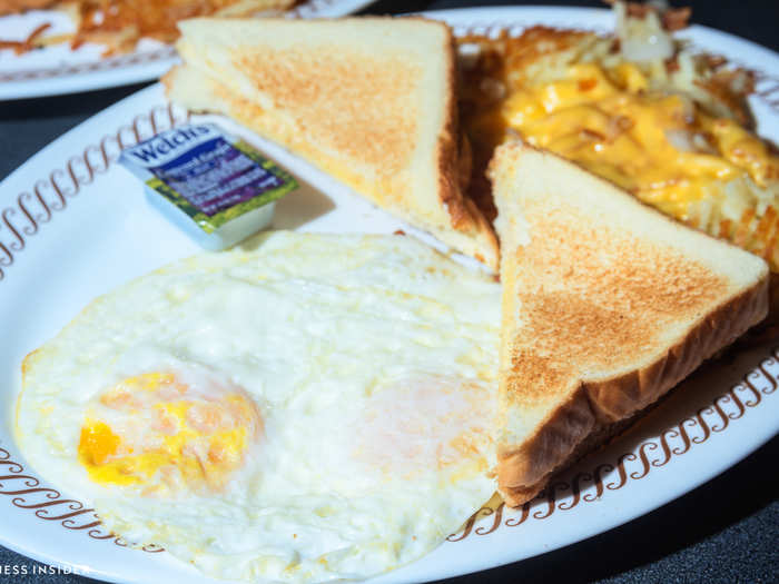 The eggs are cooked to order — in this case, over easy — and we had no complaints. The toast is what one would expect: crucial for sopping up the yolk, but nothing special. The hash browns, however, are a different beast entirely.