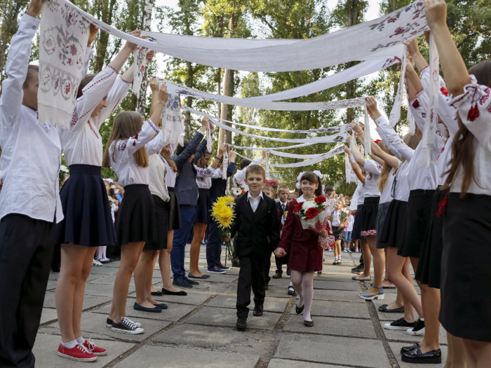 Ukraine: First graders take part in a ceremony to mark the start of another school year in Kiev, the capital city of Ukraine.