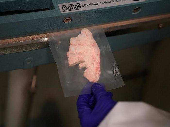 The final product is a precisely cut sample whose severed portion can be studied or shipped out, while the remaining portion can go back with the rest of the freezer samples.