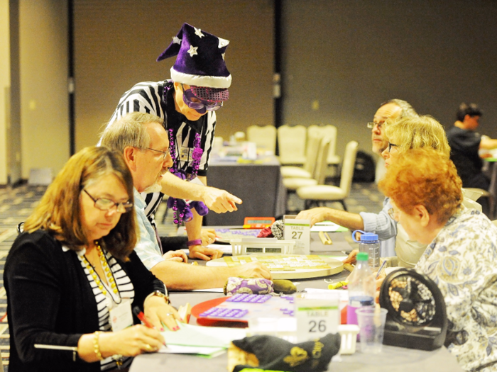 Tournament directors — some of whom wore New Orleans-appropriate accessories — were on hand to settle disputes between players.