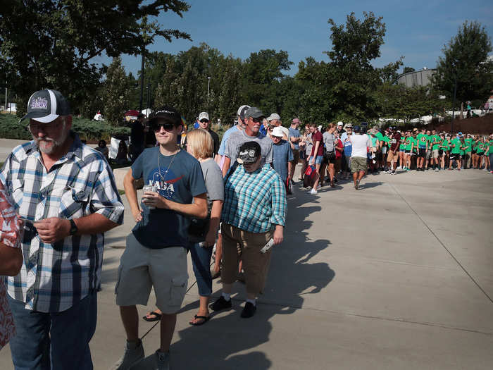 People waited in line long before the gates opened at the stadium on the Southern Illinois University campus. Southern Illinois will experience the longest duration of totality in the US, at approximately two minutes and 40 seconds.