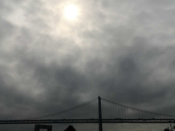 While it was cloudy, they were treated to a good view while wearing eclipse glasses.