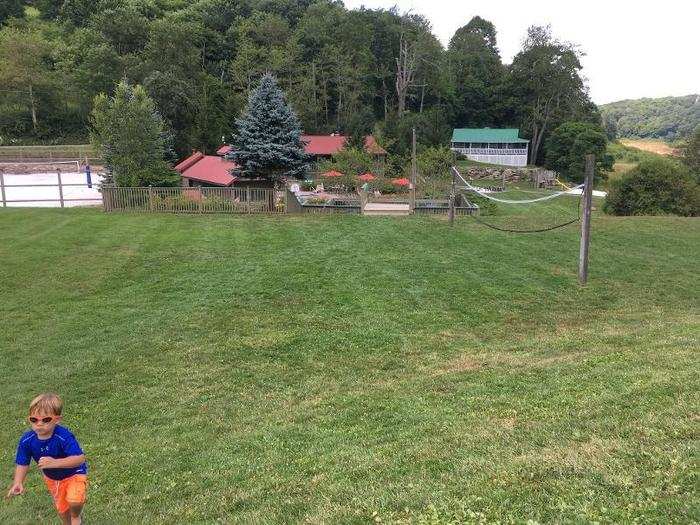 Today, the lawn has a few games, like volleyball, chess, and tetherball, plus a small pool. It