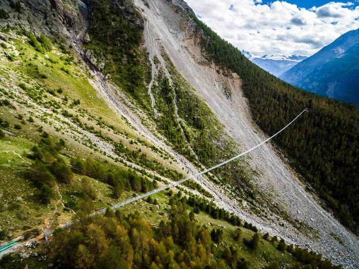 The boulders also destroyed a 820-footlong bridge that opened just two months before the avalanche. The Charles Kuonen Suspension Bridge replaced it.