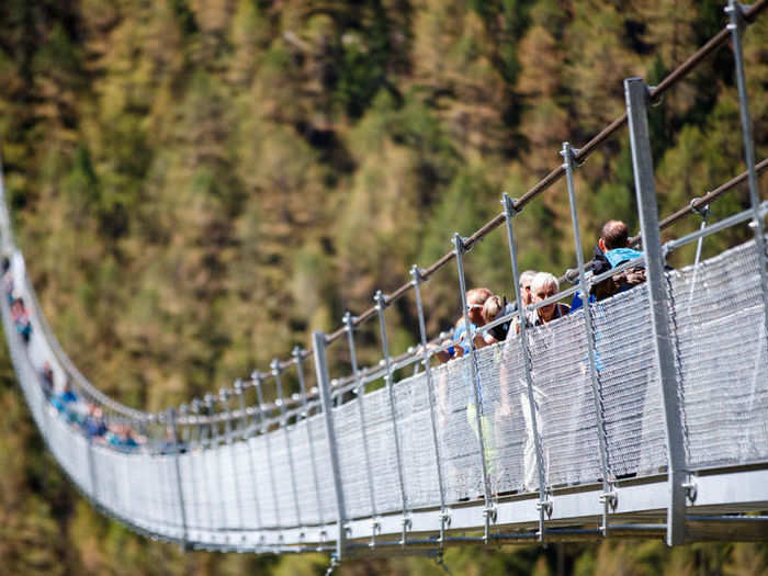 The metal bridge swoops over the deepest valley in Switzerland, and hangs around 275 feet above ground level. The deck is just 25 inches wide.