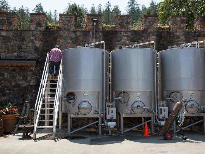 Fermentation tanks sit outside, drawing a stark contrast to the brick castle walls. Castello di Amoroso contains nearly one million antique bricks from torn-down Austrian palaces.