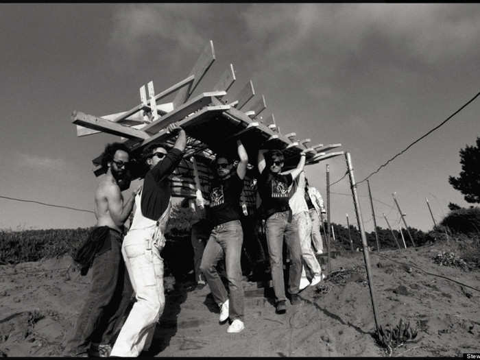 Burning Man started in 1986, when a group of 35 people set a "man" made of scrap lumber ablaze on a San Francisco beach. They wore casual jeans, overalls, and t-shirts.