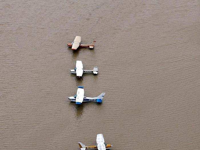 A small airport near the Addicks Reservoir left these planes on the ground amid rising floodwaters.