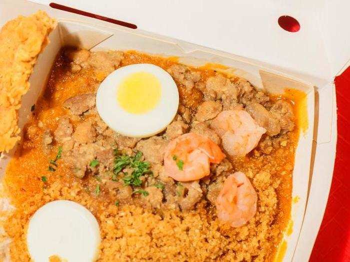 What is remarkable, however, is the fiesta palabok noodles. This is a fast-food take on a traditional Filipino noodle dish, consisting of rice noodles covered in a garlicky sauce,  crushed pork rinds, shrimp, parsley, and a slice or two of hard-boiled eggs.