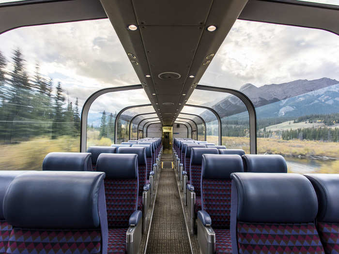 Passengers of the Canadian spend three days watching golden prairie fields, rugged lake country, and picturesque towns pass by their dome cars from Toronto to Vancouver.