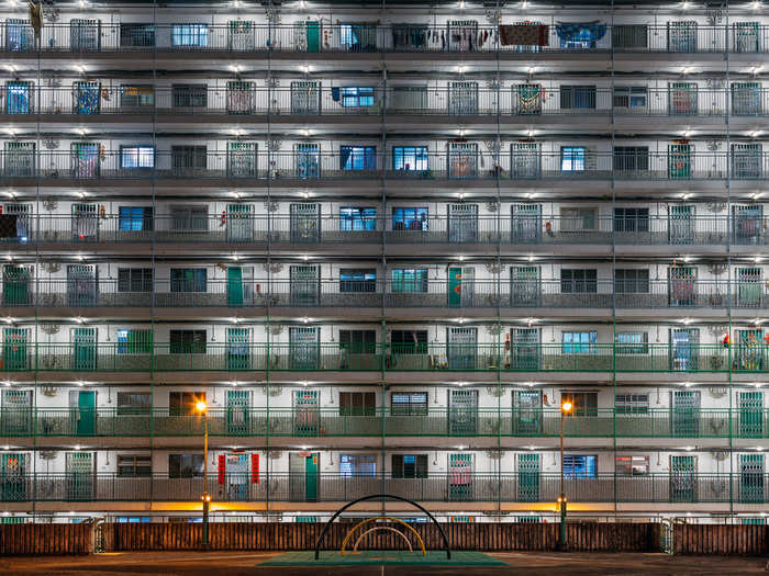 With his Canon 5D in hand, he wandered the streets of Hong Kong in search of more understated residential high-rises to photograph.