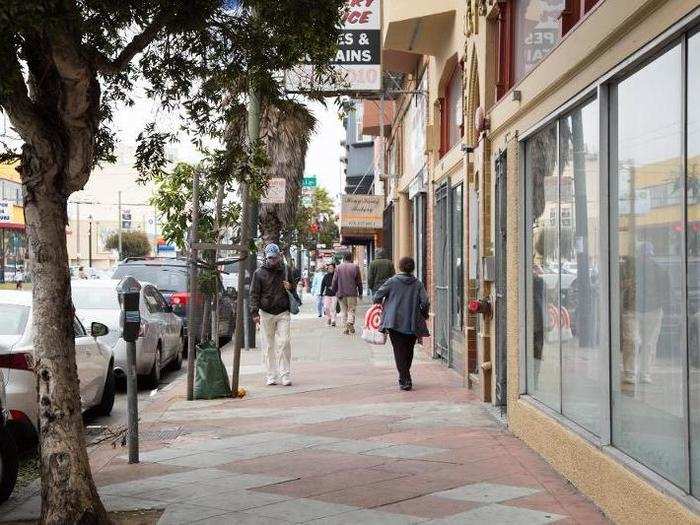 The section of Mission Street where Calabria Bros. sits is marked by boarded-up windows and empty storefronts. There is little to do on the Excelsior