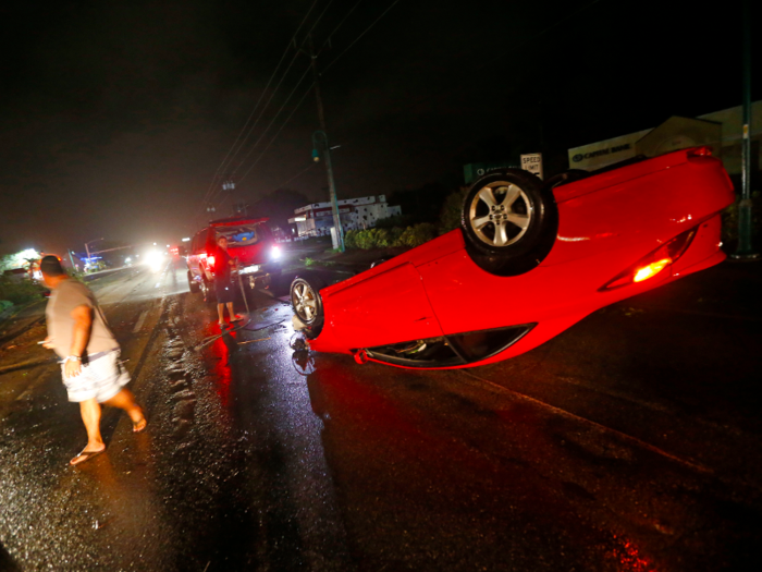 In other parts of the city, entire vehicles were overturned by the gusty winds.