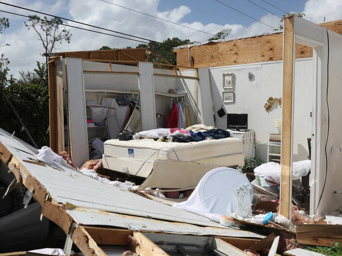 Homes were destroyed, power lines were toppled, and cars were sunk by Irma