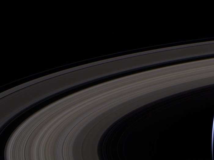 Another photo shows the rings from a different side of the planet ...