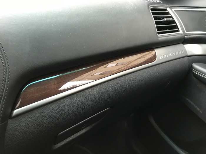 More wood trim. The interior is handsome, with brushed metal. top-stitched leather, and most wood elements throughout.