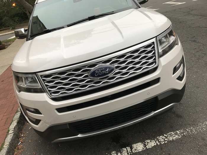 The waveform grille and backward-wrapping headlights reduce the overall massiveness of the front end, but the Explorer continues to have a powerful road presence when viewed from this angle.