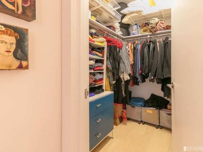 The walk-in closet is luxurious.