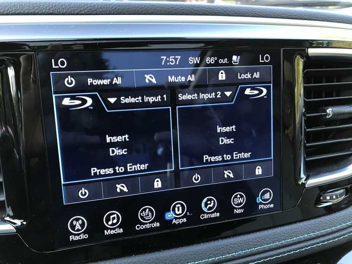 You can operate both second-row screens from the center touchscreen in front.