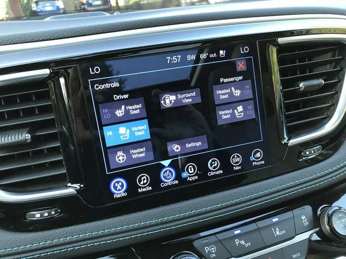Some vehicle functions are managed through the touchscreen interface, such as heated and cooled seats, the heated steering wheel, and the rear climate.