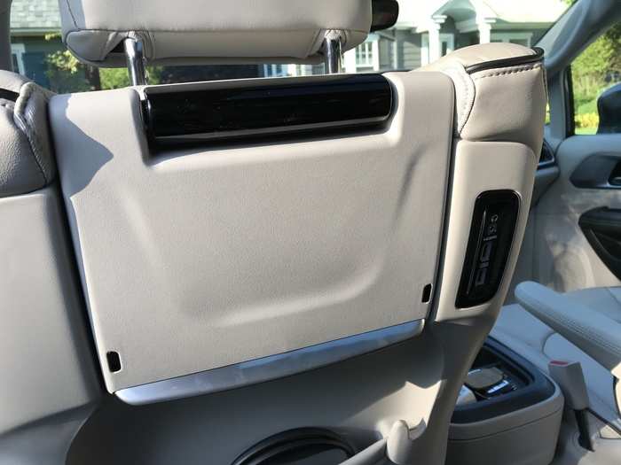 The entertainment system in the second row is based on flip-down tablet-style screens — one for each seatback.