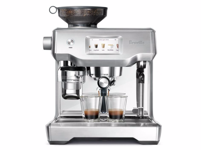 Breville Oracle Touch is an automatic espresso machine that handles grinding, dosing, tamping, and milk texturing — all from a handy color touch screen. The walk-thru guides are meant to help novice home baristas hone their skills.