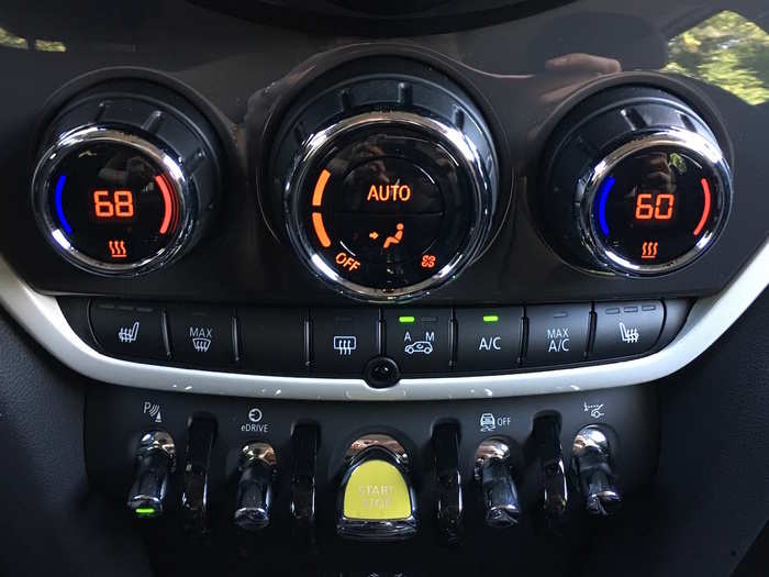 You can flip through the three different driving modes using the "eDrive" switch to the left of the yellow start button, which fires up the whole car.