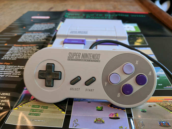 Not everything about the Super NES Classic Edition is tiny — the game pad is a near perfect re-creation of the original. The game pad is normal-sized, even though it looks like a giant in comparison with the console.