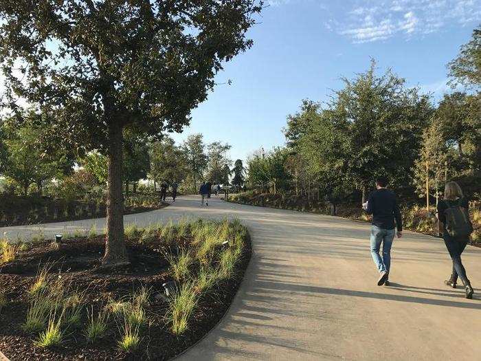 The campus surrounding the "spaceship" is designed to look like a park.