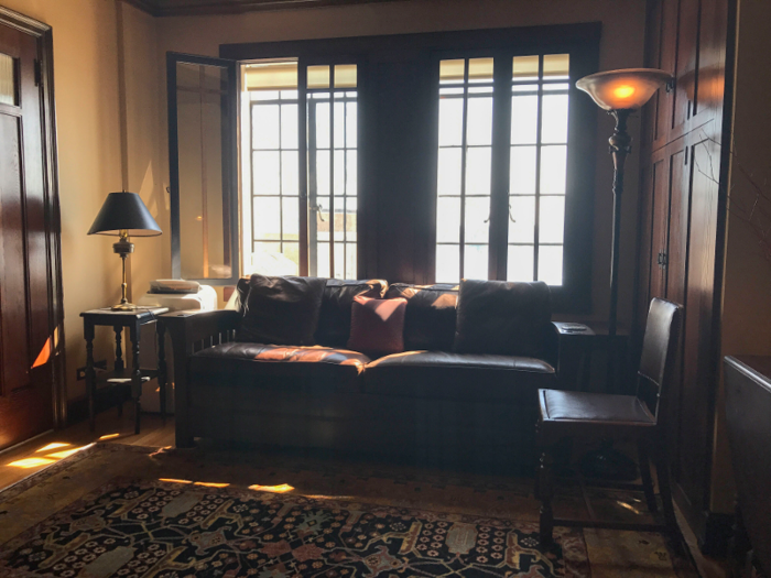 The room was reconstructed by its current owners to match the historic and original design of the Windsor Tower. Tile and wood line the room.