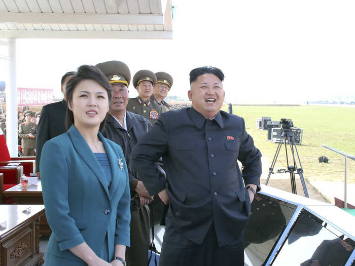 "While a welcoming song was resonating," state television reported, "Marshal Kim Jong Un appeared at the ceremony site, with his wife, Comrade Ri Sol-ju."