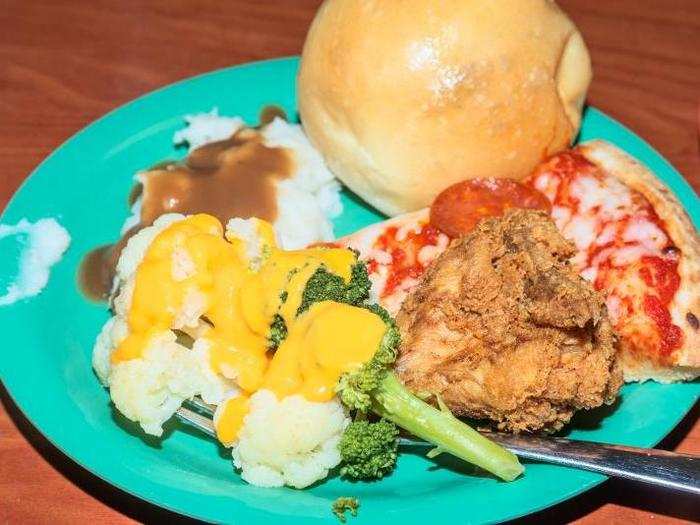 This plate represented the best and worst of Golden Corral. The bread? Divine. The pizza? Hellish. Fried chicken? Okay! Cheese sauce-smothered vegetables? Evil.